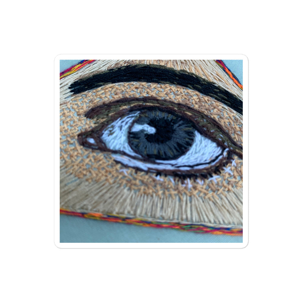 Hand-embroidered realistic all seeing eye with detailed thread work on bubble-free sticker