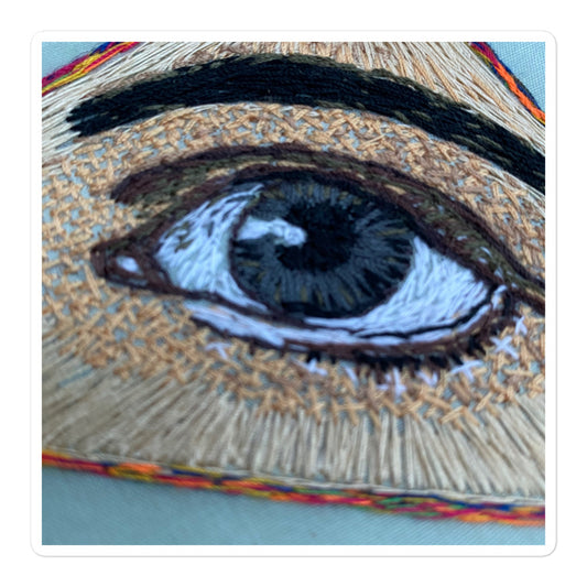 Hand-embroidered realistic all seeing eye with detailed thread work on bubble-free sticker