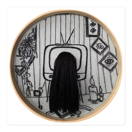 Black thread embroidered retro living room with girl's head and hair coming out of TV and self-help book on floor