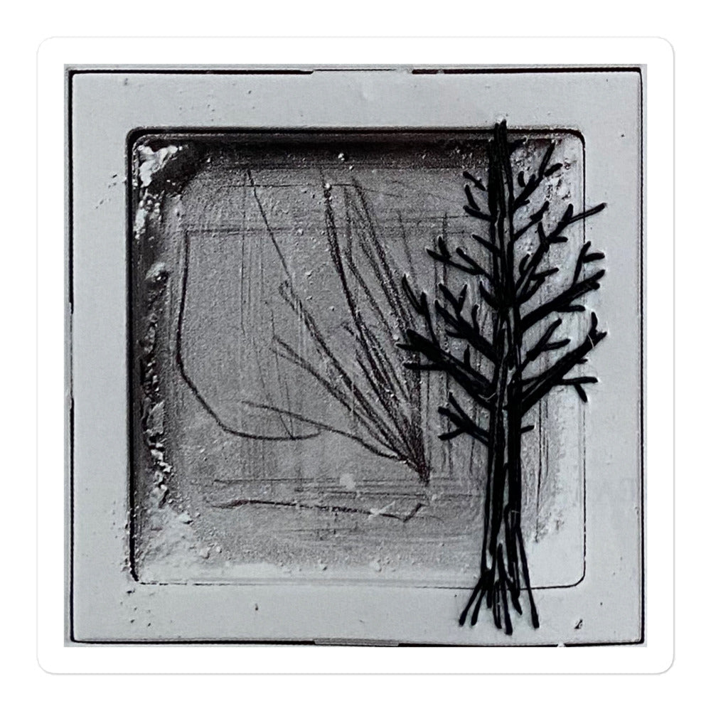 Black thread embroidered bare winter tree on vintage magazine page