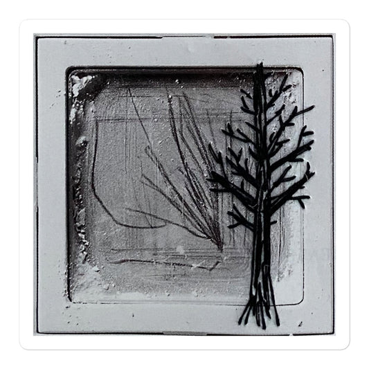 Black thread embroidered bare winter tree on vintage magazine page