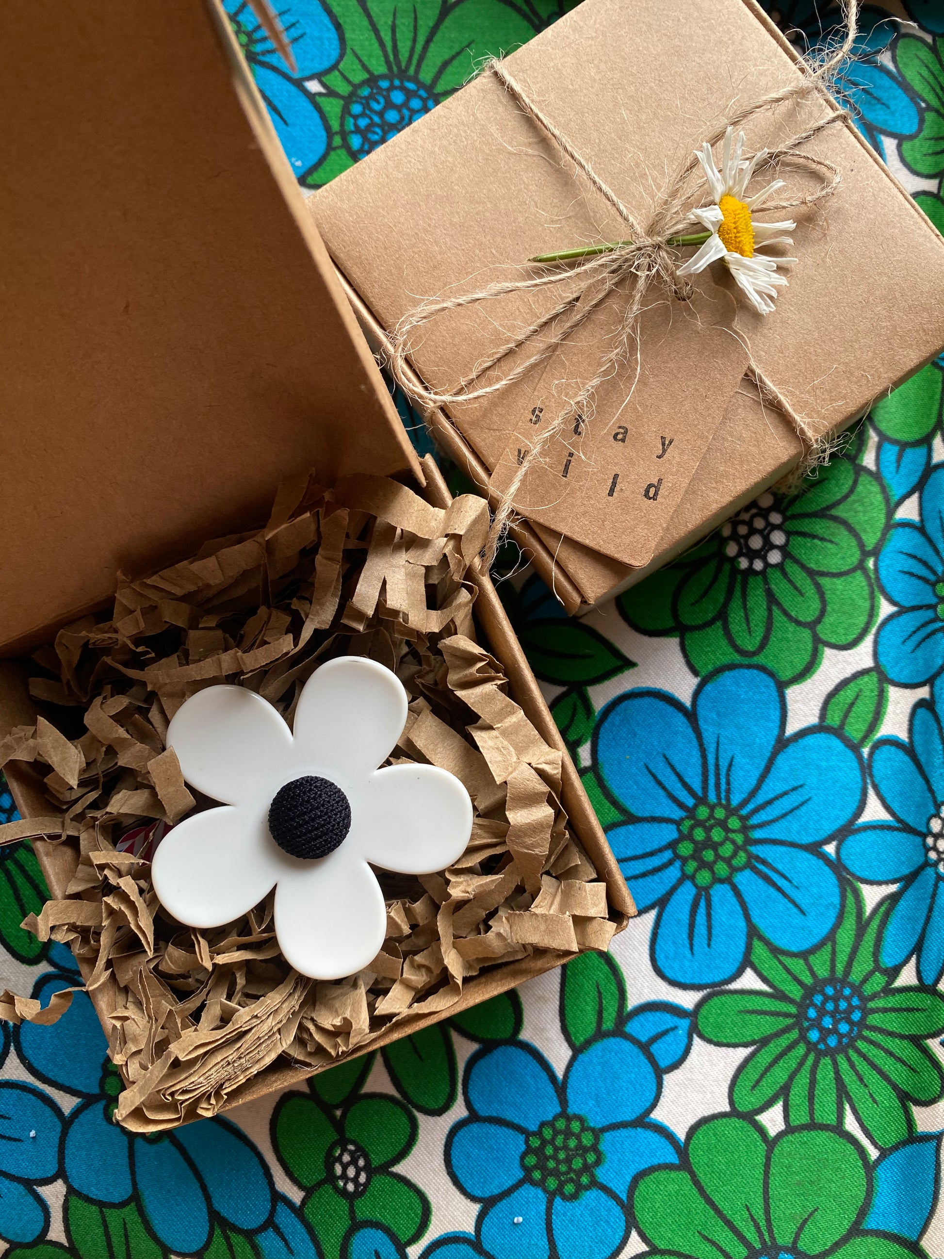 Handmade medium daisy ring with white petals and black button center and gift box