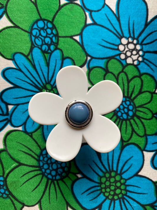 Handmade medium daisy ring with white petals and blue button center